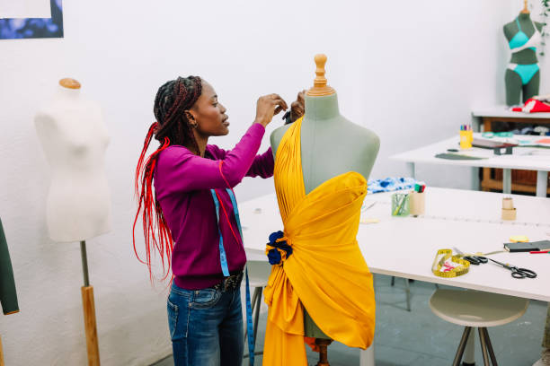 A girl completing her fashion designing project in IFCT