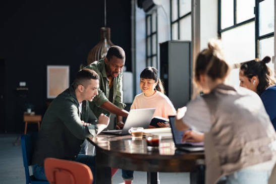 People discussing regarding a project in a Business meeting