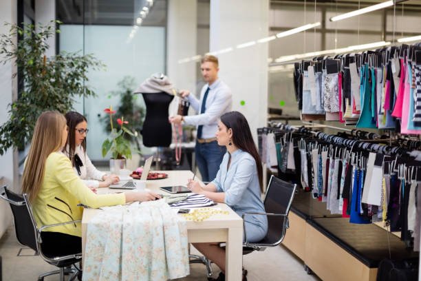 Business people on a meeting, deciding on textile pattern